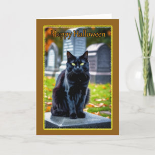 Svart katt på kyrkogård på Halloween Helgkort