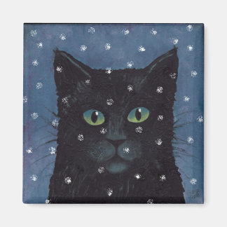 Svart katt på vintern snö magnet