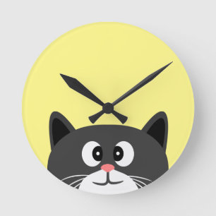 svart katt rund klocka