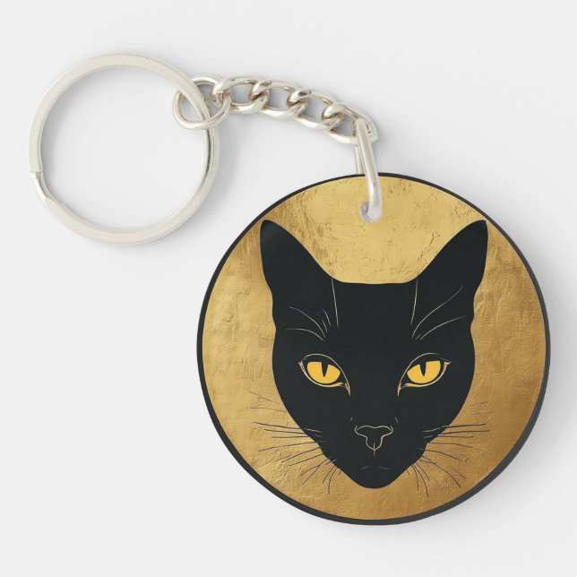 Svart katt siluett mot en guldkrets (Framsidan)