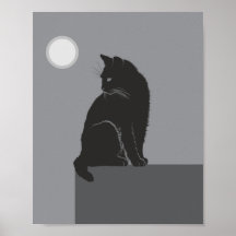 svart katt sitter på bordet