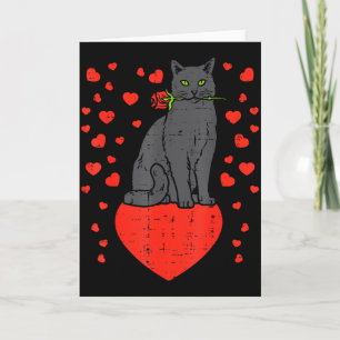 Svart katt som biter ros hjärtan Alla hjärtans dag Kort