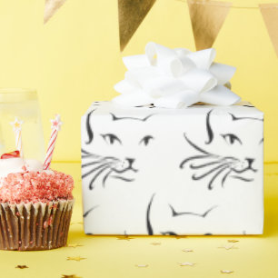 Svart kattskiss på vitt presentpapper