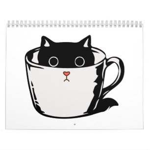 Svart kattunge med röd näsa gömmande i kopp kalender