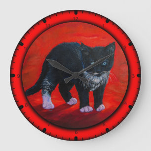 Svart kattunge stor klocka