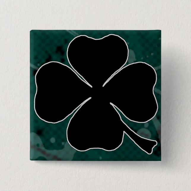 Svart klöver klämmer fast knapp (Framsida)