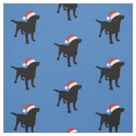 Svart lab hund som ha på sig den Santa julhatten Tyg