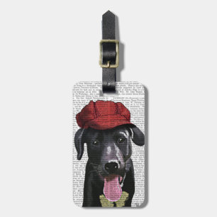 Svart labrador med rött tak bagagebricka