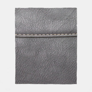 Svart läder sytt med vit sömnad fleecefilt