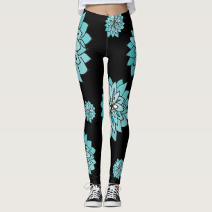 Svart lägga benen på ryggen med grafiska leggings