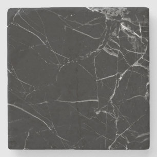 Svart marmorkustfartyg underlägg sten