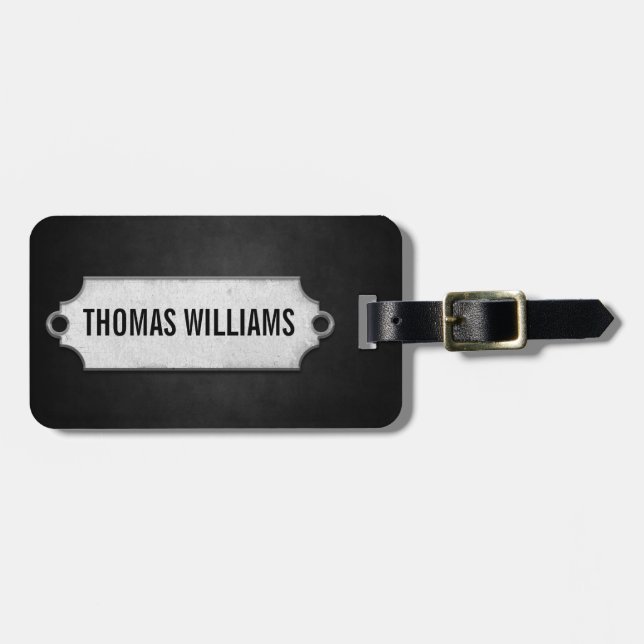 Svart mjuk struktur med metall märkre bagagebricka (Horisontell Framsida)