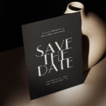 Svart Modern Bröllop | Nutida Foto & QR Spara Datumet<br><div class="desc">Skapa ett slående första intryck med det här svarta "save the date"-bröllopskortet, designat för par som älskar modern enkelhet med en dramatisk kant. Framsidan har en djärv, minimalistisk typografi mot en djupsvart bakgrund, vilket skapar en förfinad och modern utseende som omedelbart sätter tonen för din fest. Baksidan har plats för...</div>