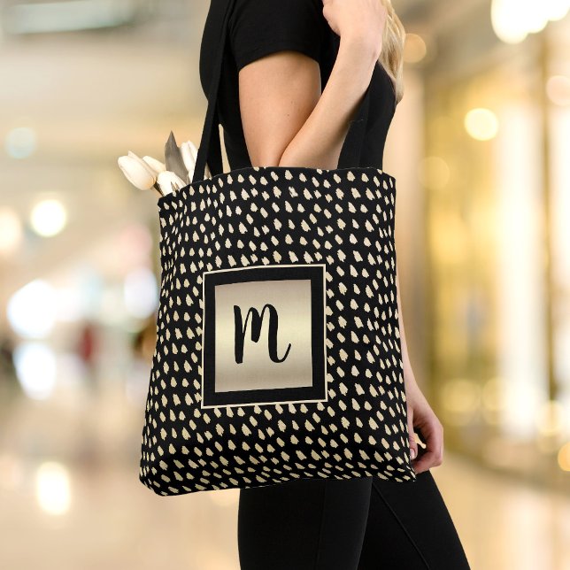 Svart monogram guld folie skrift prickar modern fe tygkasse (Skapare uppladdad)