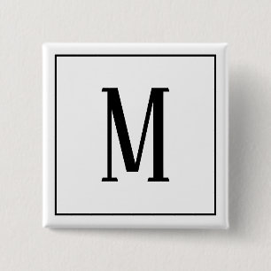 Svart monogram på vit fyrkantig knapp