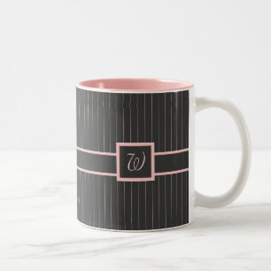 Svart mugg med rosa randiga ränder