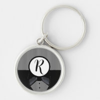 Svart nyckelring med monogram i smokingmotiv