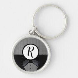Svart nyckelring med monogram i smokingmotiv