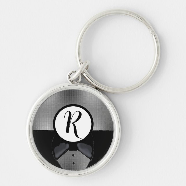 Svart nyckelring med monogram i smokingmotiv (Framsidan)
