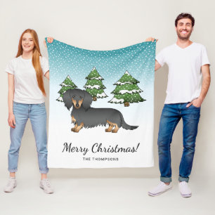 Svart och brun långhårig Dachshund - Vinter skog Fleecefilt
