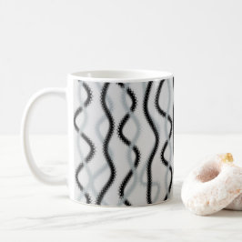 Svart och grått vågar kaffemugg