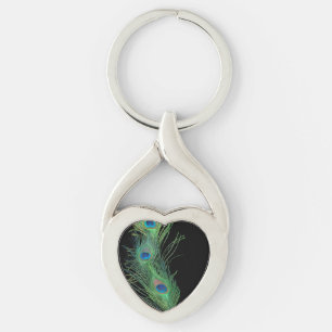 Svart och grön påfågelfjäder twisted heart silverfärgad nyckelring