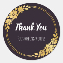 Svart och guld-affärsmärken runt klistermärke