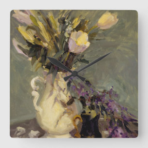 Svart och guld fyrkantig klocka