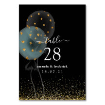 Svart och guld glitterballongbröllop