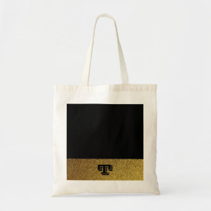 Svart och guld med monogram tygkasse
