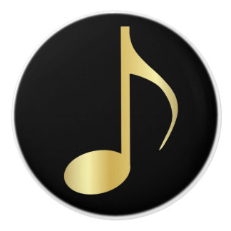 Svart och guld- musik noterar knoppen knopp