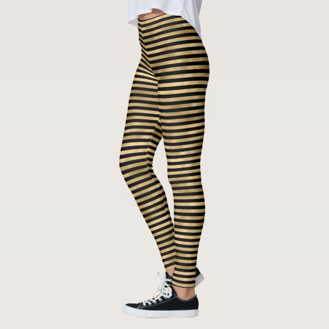 Svart och Guld Rand Leggings (Vänster)