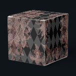 Svart och roséguld presentaskar<br><div class="desc">Elegant presentbox med roséguld damask och svarta harlekinmönster.</div>