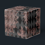 Svart och roséguld presentaskar<br><div class="desc">Elegant favor-box med roséguld-damask och svarta harlekinmönster.</div>
