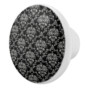 Svart och silverdamast knopp
