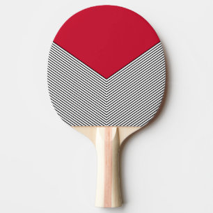 Svart och vit chevron-design och röd triangel pingisracket