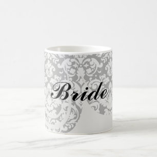 Svart och vit damm blommar kaffemugg