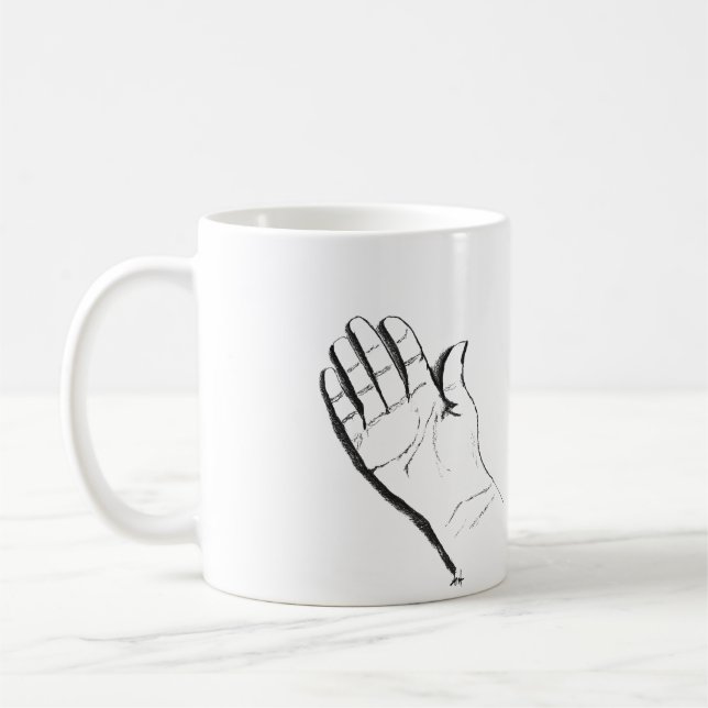 svart och vit hand på kaffemugg (Vänster)