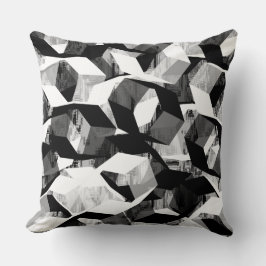 Svart och vit hexagon på pixelrelaterad kudde