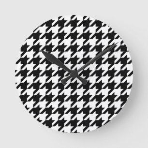 Svart och vit houndstooth-kontroll rund klocka