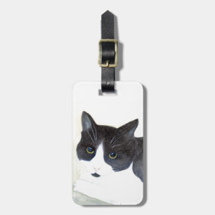 Svart och vit katt bagagebricka