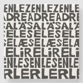 Svart och vit "Läs" på 8 språk Lino-klipp Stenunderlägg