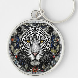 Svart och vit leopard omgiven av blommor rund silverfärgad nyckelring