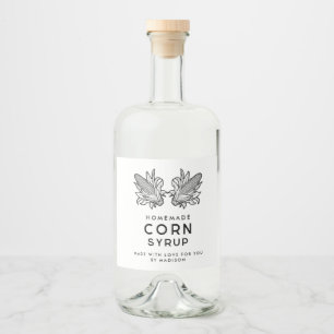 Svart och vit majssirap med två kolvar spritflaskor etikett