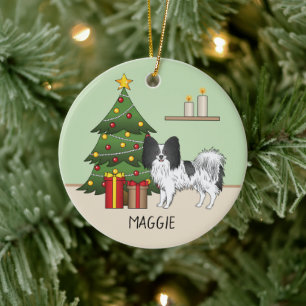 Svart och vit papillonhund vid en julgran julgransprydnad keramik
