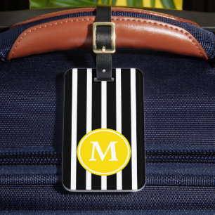 Svart och vit rand med gul monogram bagagebricka