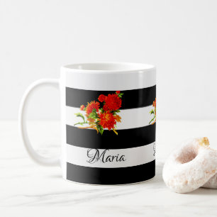 Svart och vit randig mugg med blommor