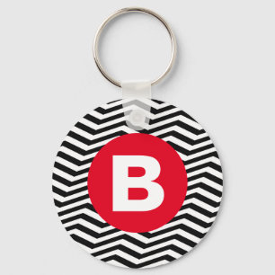Svart och vit sicksack-mönster röd monogram nyckelring