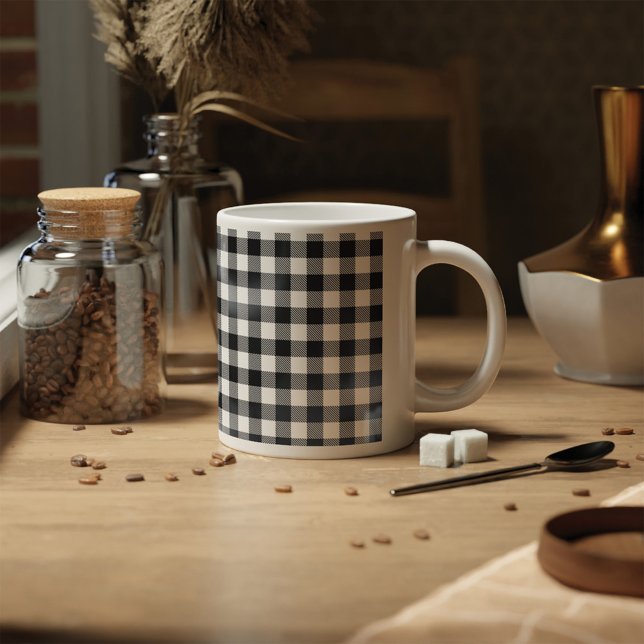 Svart- och vitkontroll med beläggning kaffemugg (Skapare uppladdad)
