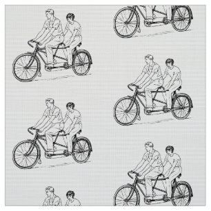 SVART OCH VITT KUPLE I RETRO TANDEM-BIKEL TYG
